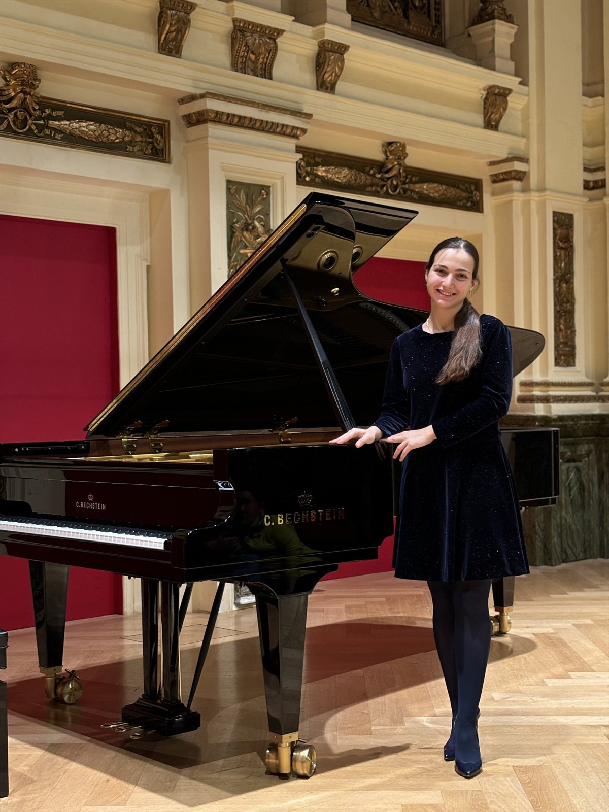 Angela Todorova on the stage of the Ehrbar Saal, Vienna, beside the C. Bechstein grand piano
