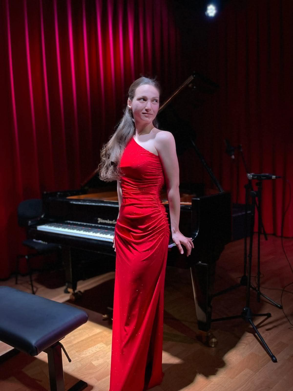 Angela Todorova on stage before a Bösendorfer grand piano