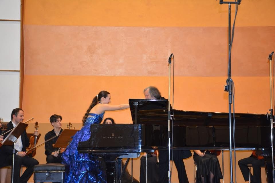 Angela Todorova greeting the conductor after a performance with orchestra